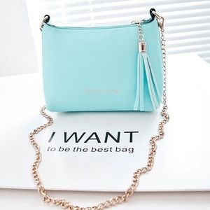 Carter’s Rimfne Ginjpin crossbody bag